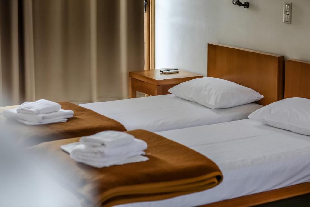 Postel nebo postele na pokoji v ubytování Eleni Suites Methoni
