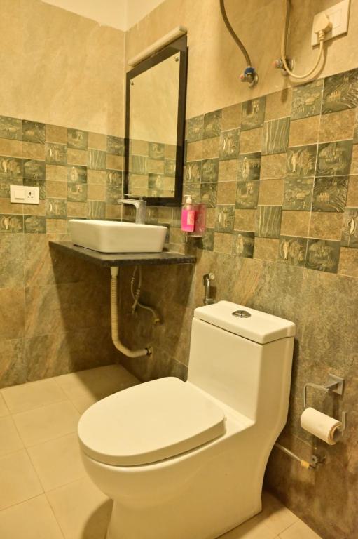 Koupelna v ubytování Hotel Wedlock Premium Huda City