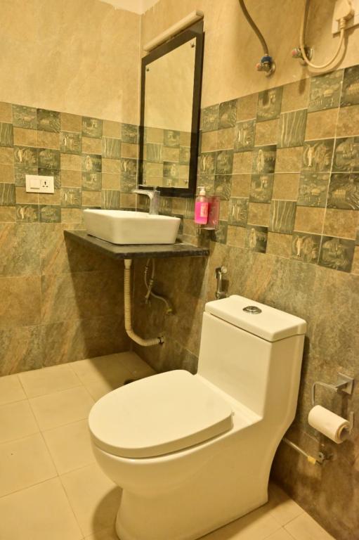 Koupelna v ubytování Hotel Wedlock Premium Huda City