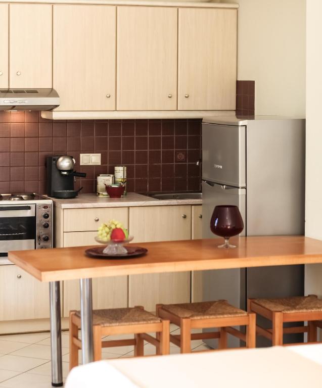 Kuchyň nebo kuchyňský kout v ubytování Eleni Suites Methoni