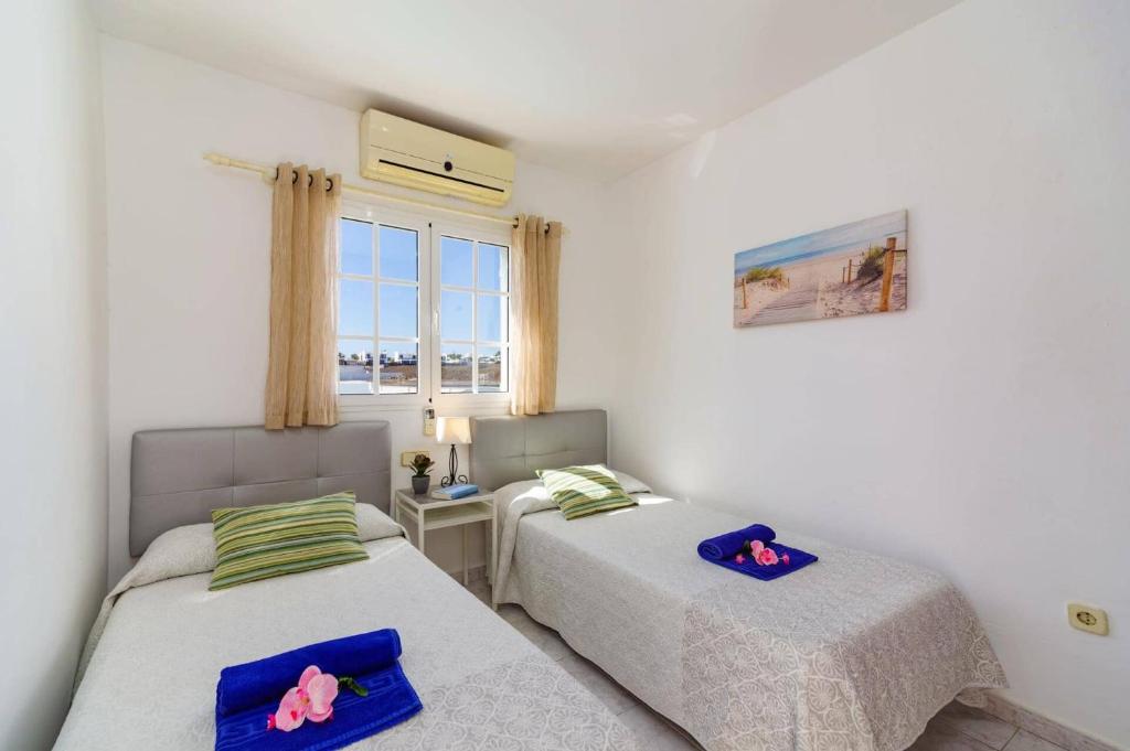Postel nebo postele na pokoji v ubytování Villa Sol Lanzarote by Villa Plus