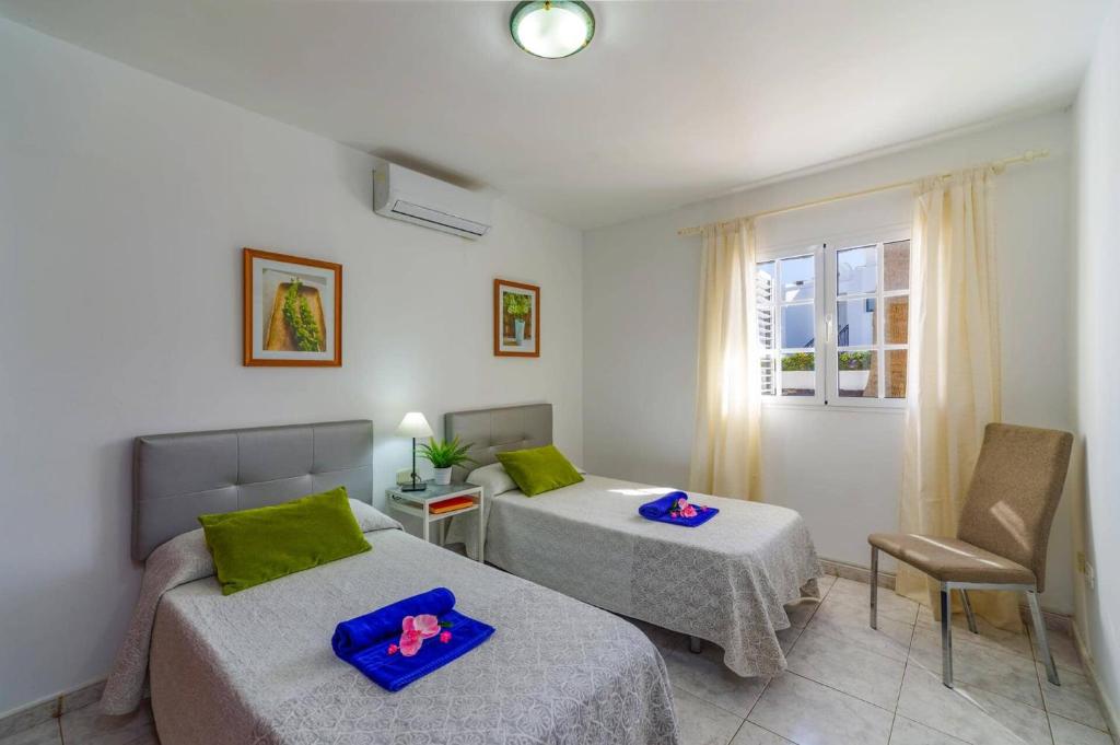 Postel nebo postele na pokoji v ubytování Villa Sol Lanzarote by Villa Plus