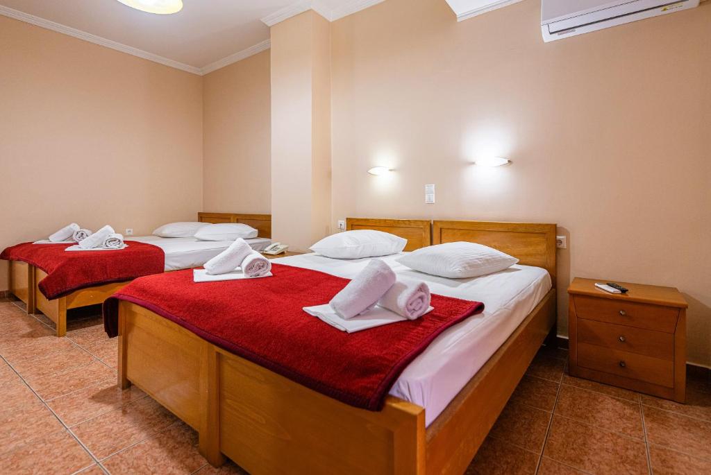Postel nebo postele na pokoji v ubytování Faros II