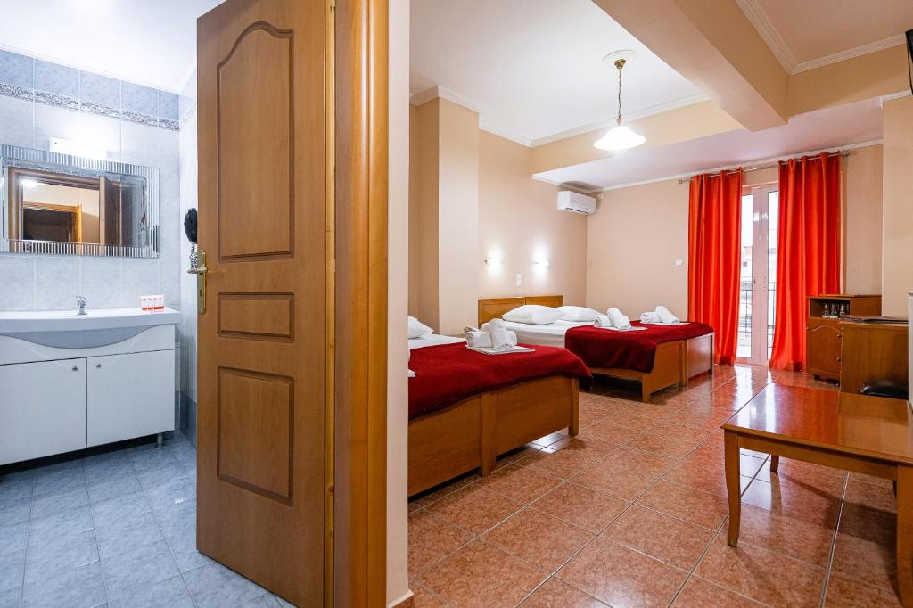 Postel nebo postele na pokoji v ubytování Faros II