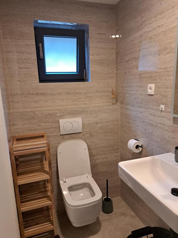 Koupelna v ubytování Normabella Holiday Home