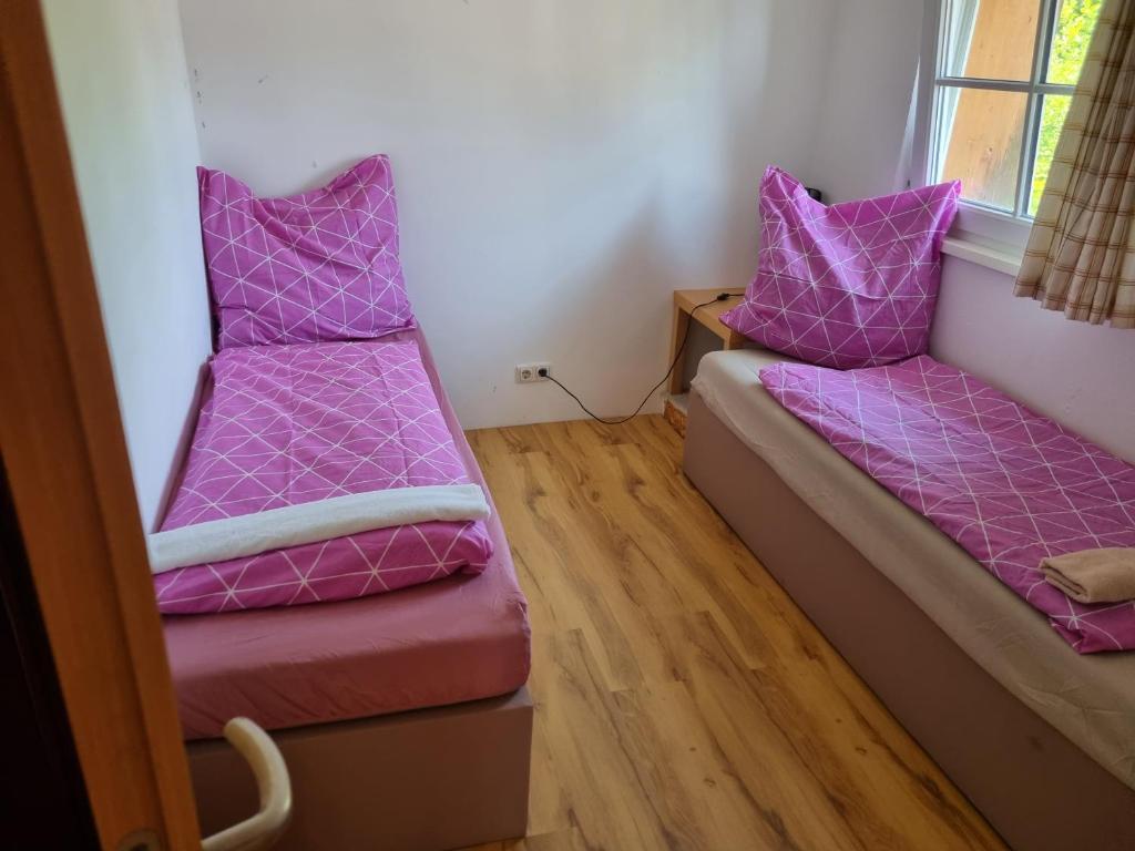 Postel nebo postele na pokoji v ubytování Pension Inntalhof
