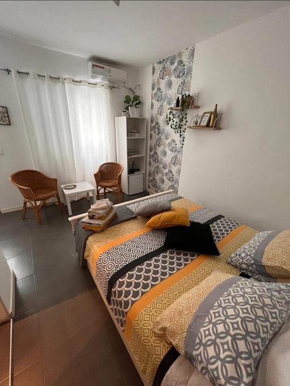 Postel nebo postele na pokoji v ubytování Deluxe B&B "Casa Alegria", Tarrafal