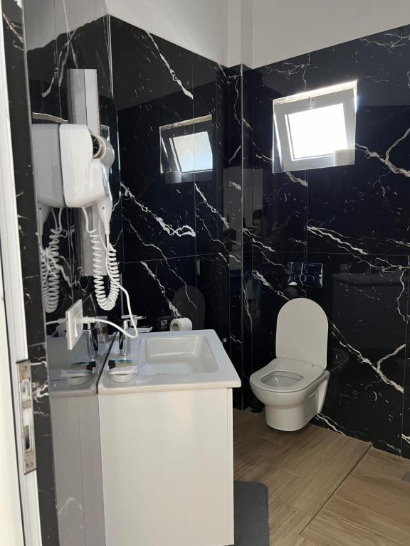 Koupelna v ubytování Hotel Real