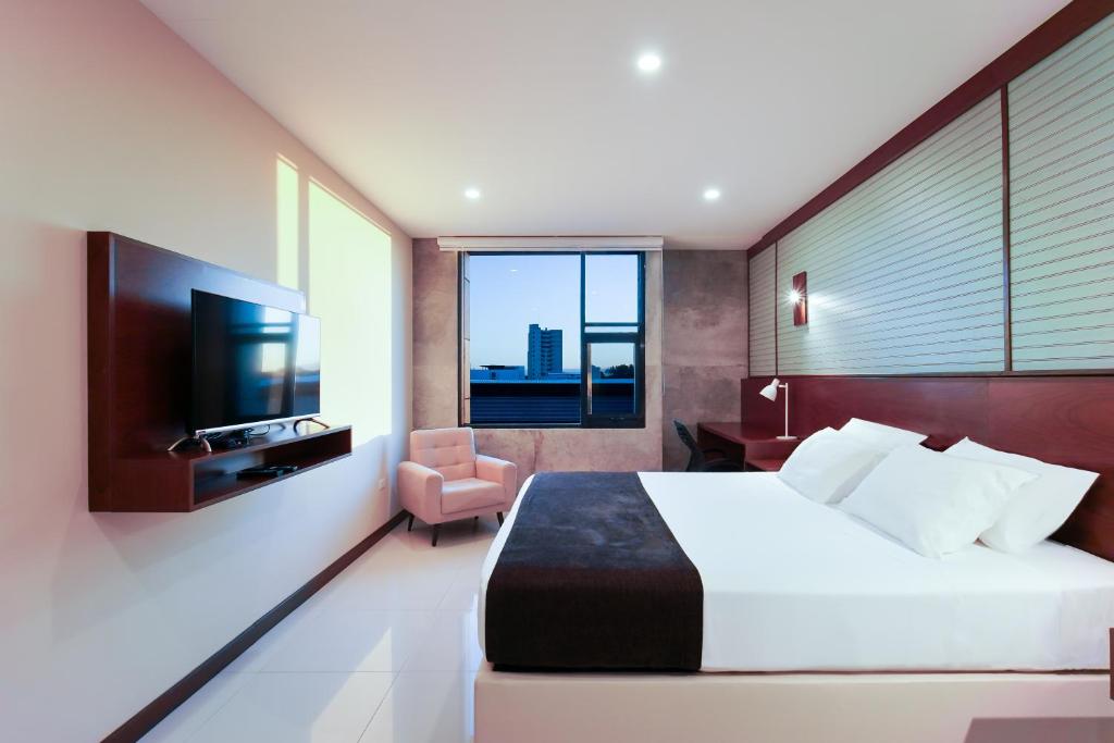 Chairu Eco Hotelにあるテレビまたはエンターテインメントセンター