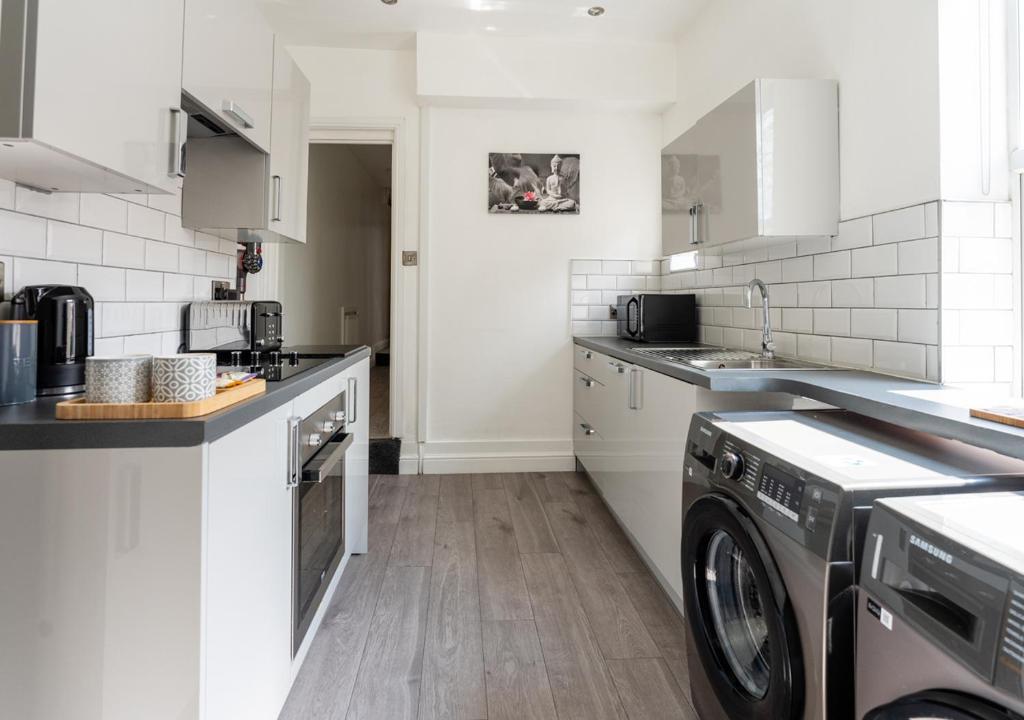 Kuchyň nebo kuchyňský kout v ubytování Tettenhall Lodge Apartment