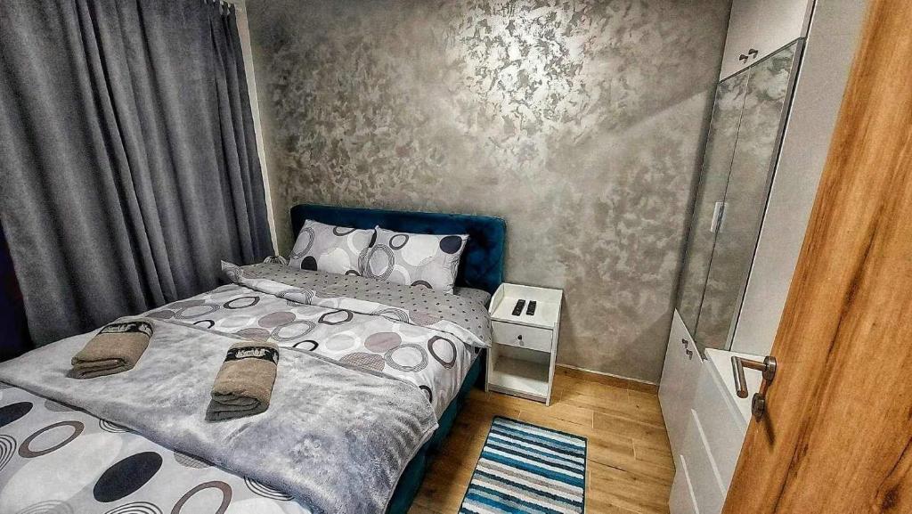 Postel nebo postele na pokoji v ubytování Green Hills MD Divcibare