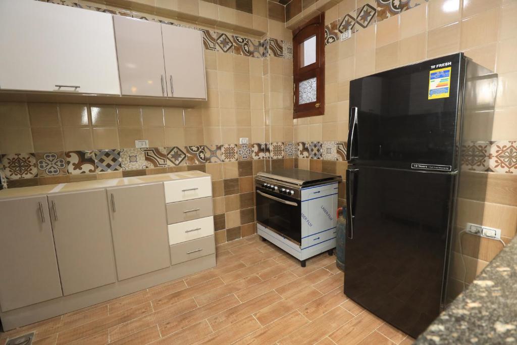 Kuchyň nebo kuchyňský kout v ubytování Ramsses Palace