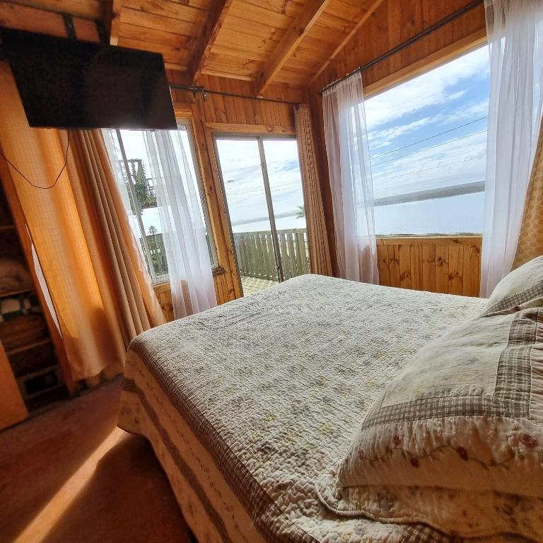 Cama o camas de una habitación en Max & Mar Pichilemu