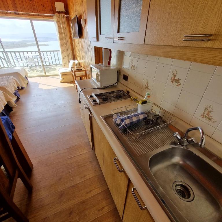 Una cocina o zona de cocina en Max & Mar Pichilemu