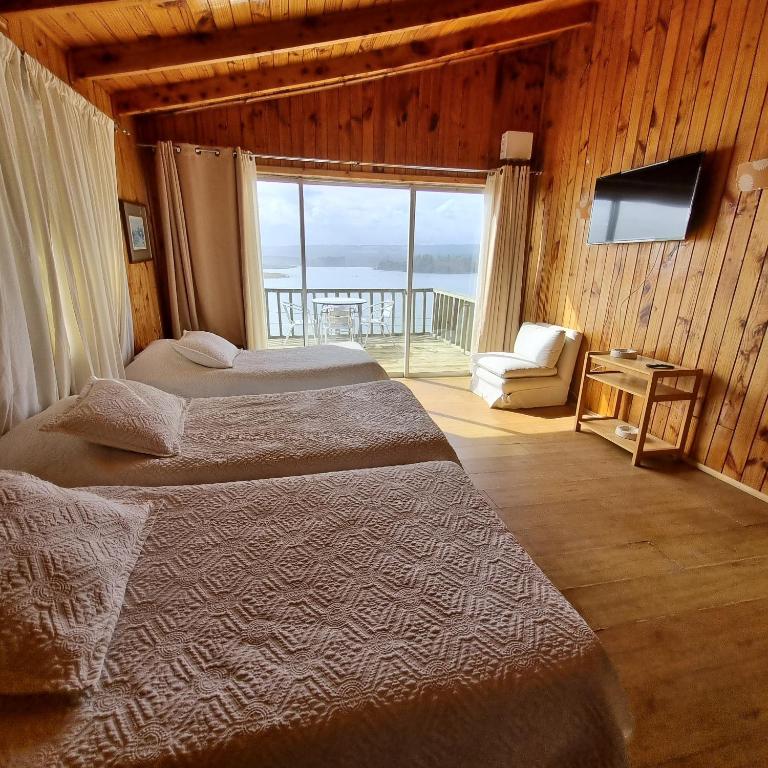 Cama o camas de una habitación en Max & Mar Pichilemu
