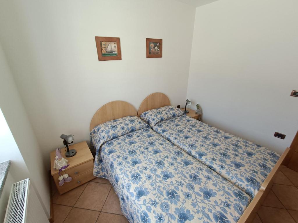 Postel nebo postele na pokoji v ubytování Appartamenti Viola Walter