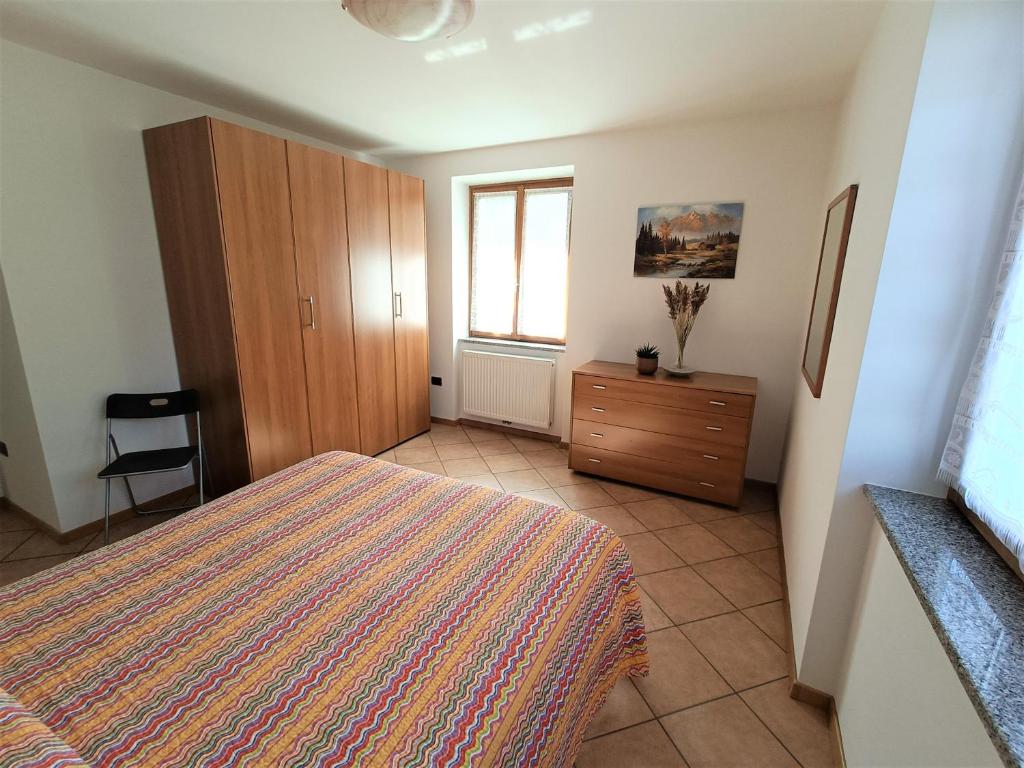 Postel nebo postele na pokoji v ubytování Appartamenti Viola Walter