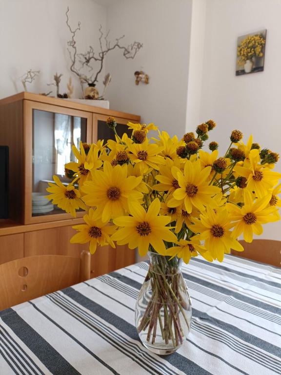 Postel nebo postele na pokoji v ubytování Appartamenti Viola Walter