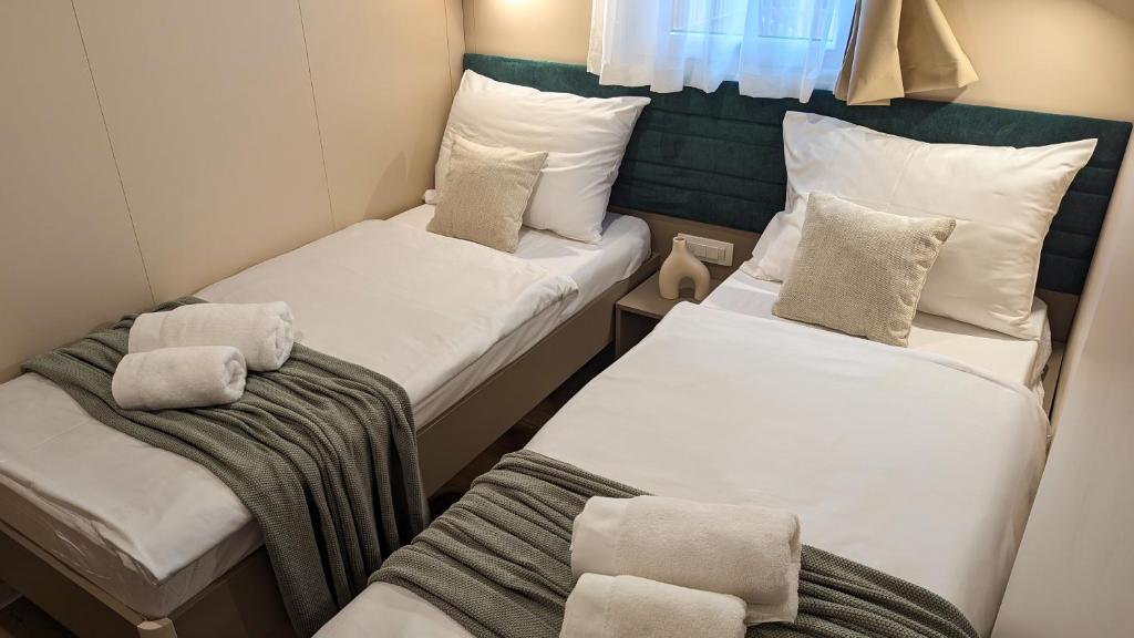 Postel nebo postele na pokoji v ubytování Mobile Homes Jaki