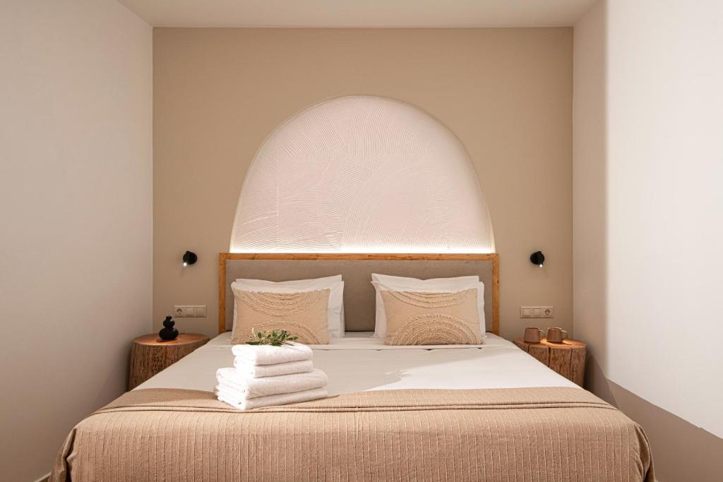 Posteľ alebo postele v izbe v ubytovaní Elèa Concept Hotel & Suites