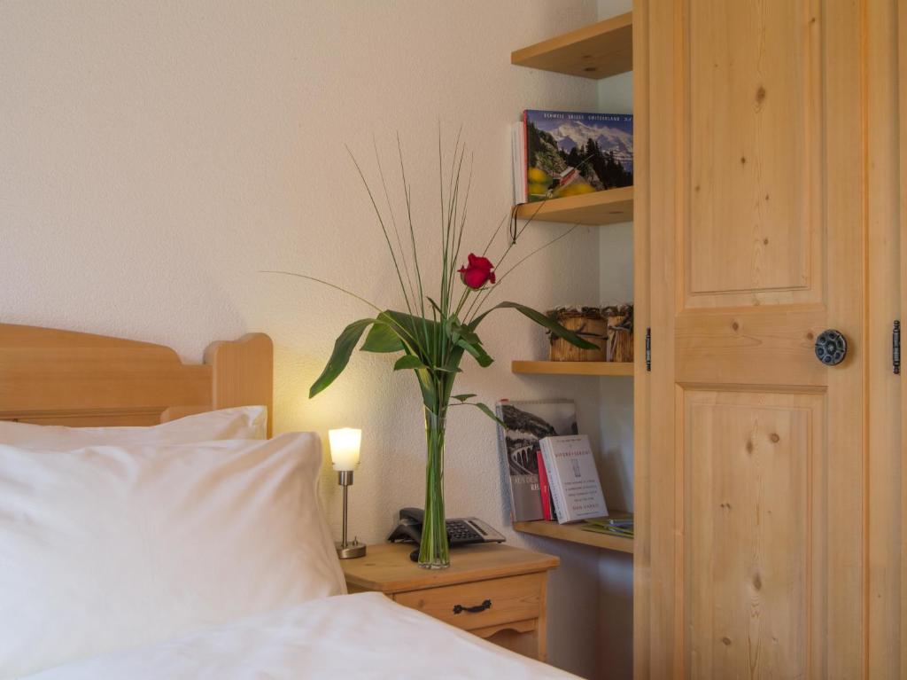 Postel nebo postele na pokoji v ubytování Alpenhof