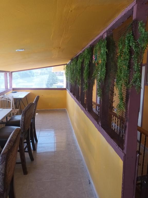Balkón nebo terasa v ubytování Hospedaje Barato Mi Casita de Colores