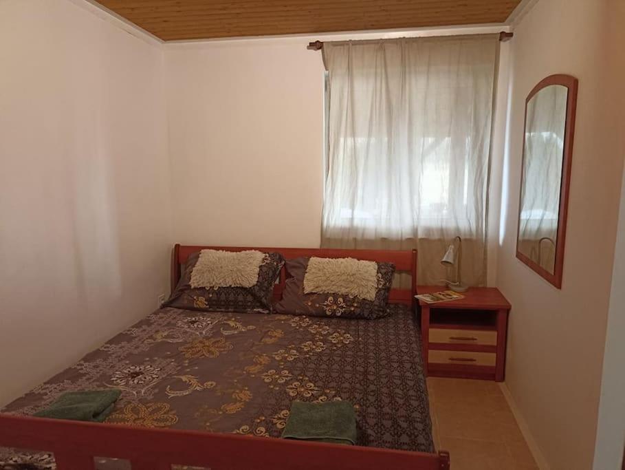 Postel nebo postele na pokoji v ubytování U rybníků