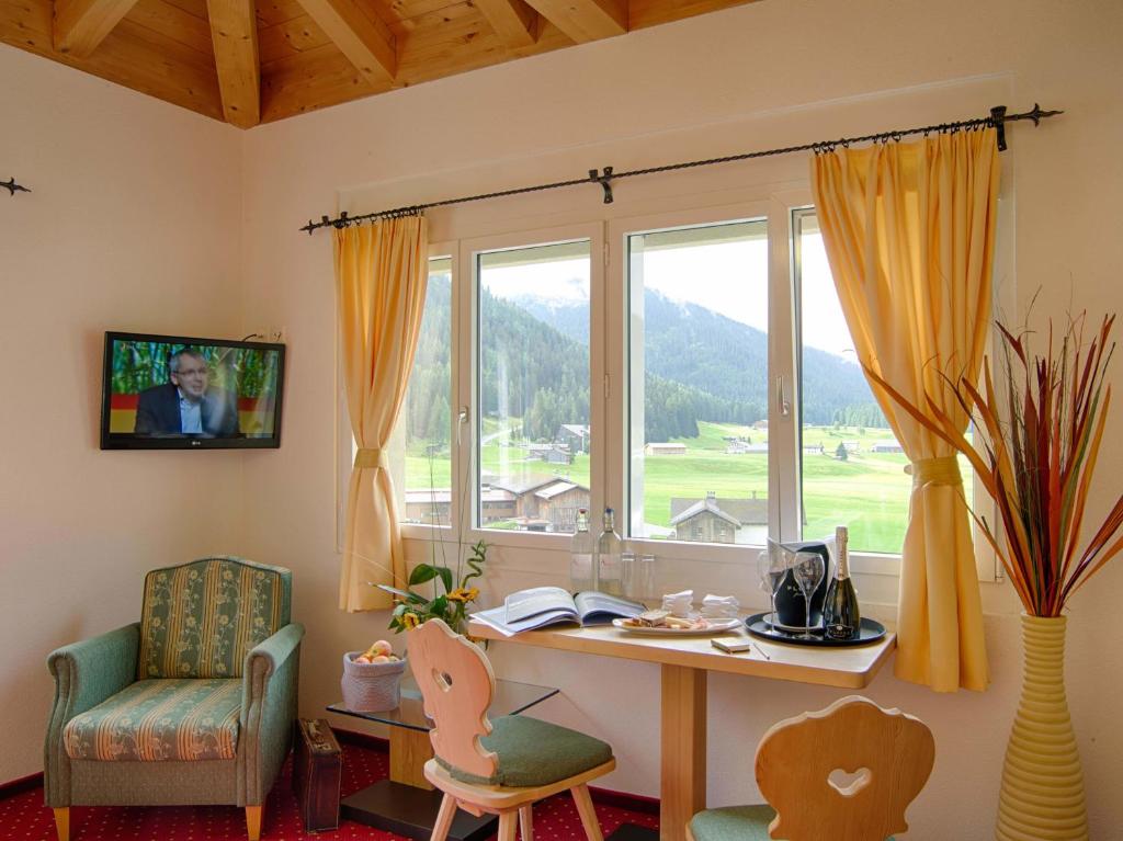 TV a/nebo společenská místnost v ubytování Alpenhof