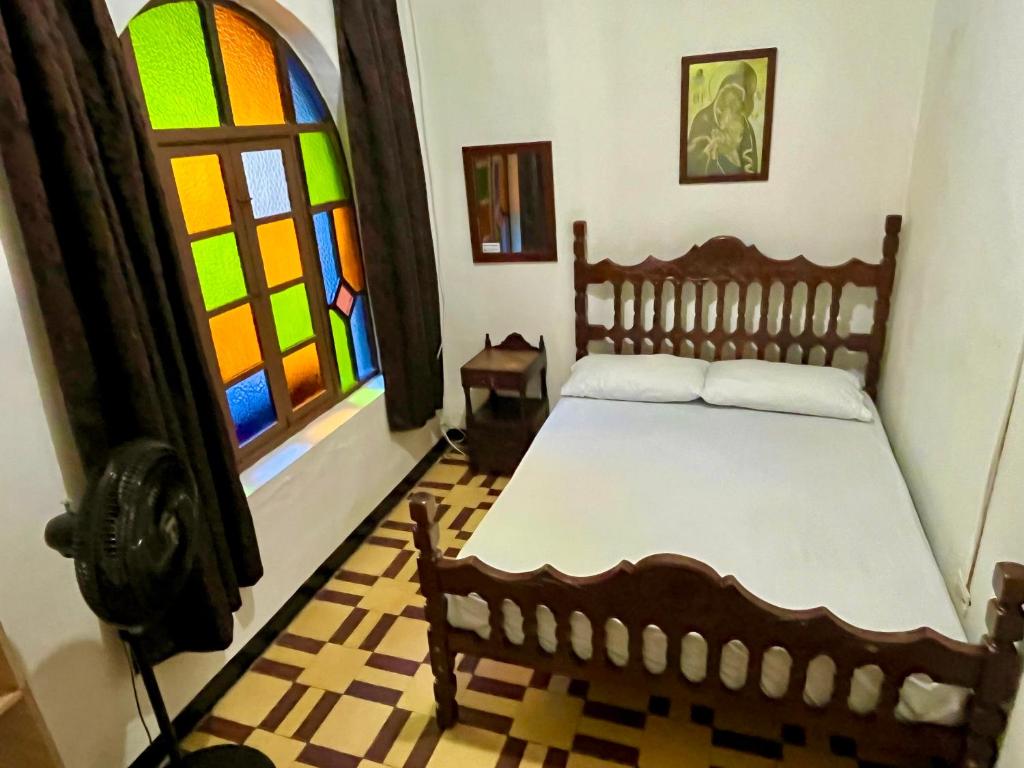 Postel nebo postele na pokoji v ubytování Casa Grande Hostal