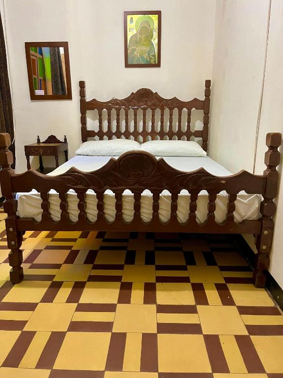 Postel nebo postele na pokoji v ubytování Casa Grande Hostal
