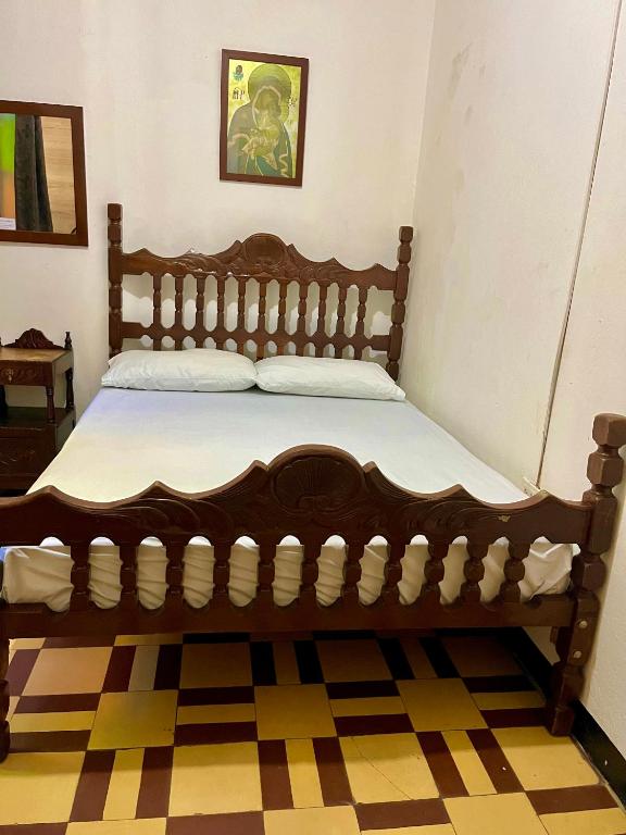 Postel nebo postele na pokoji v ubytování Casa Grande Hostal