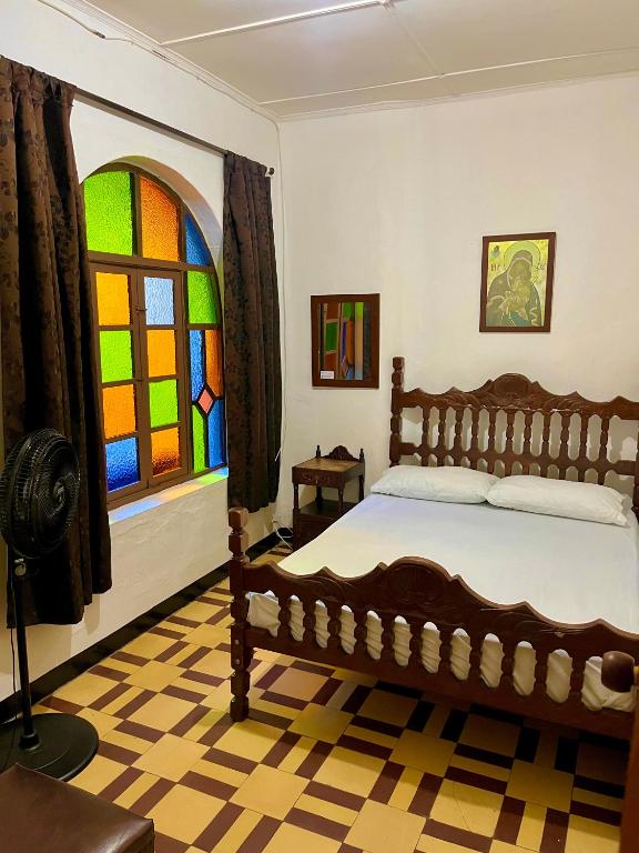 Postel nebo postele na pokoji v ubytování Casa Grande Hostal