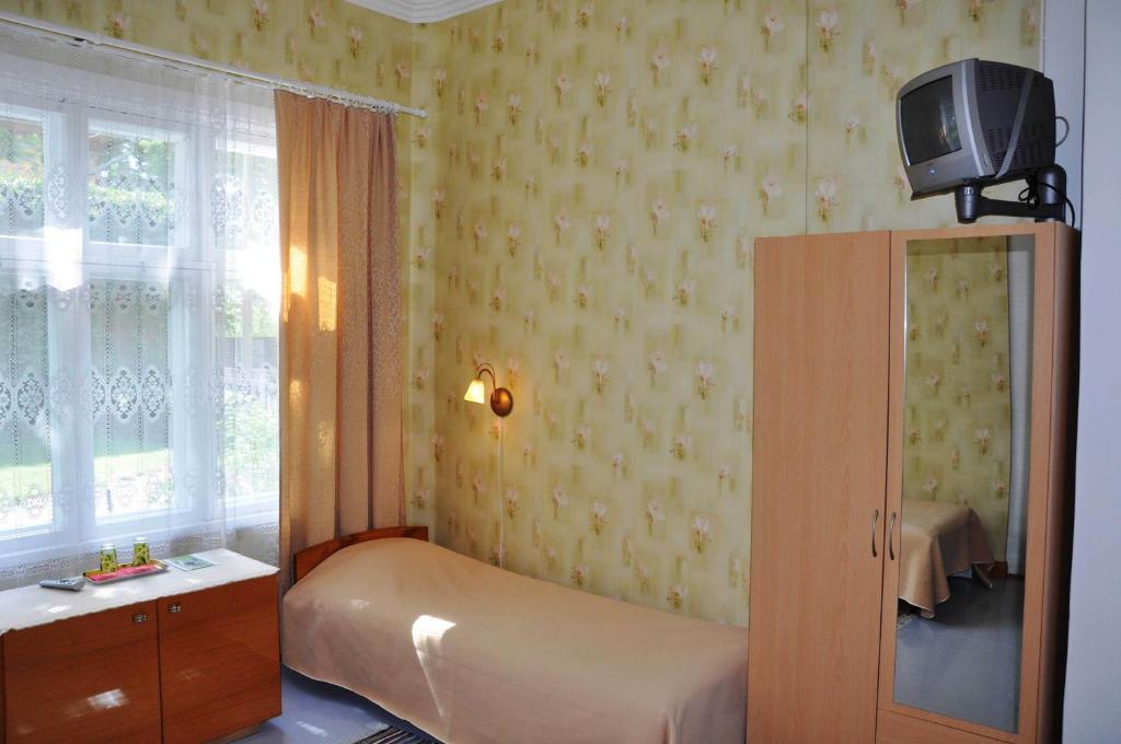 Postel nebo postele na pokoji v ubytování Tiia Guesthouse