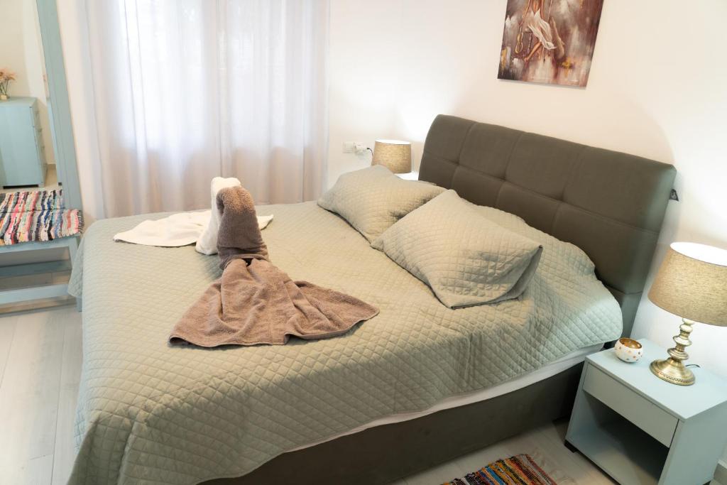 Postel nebo postele na pokoji v ubytování Pigadia Central