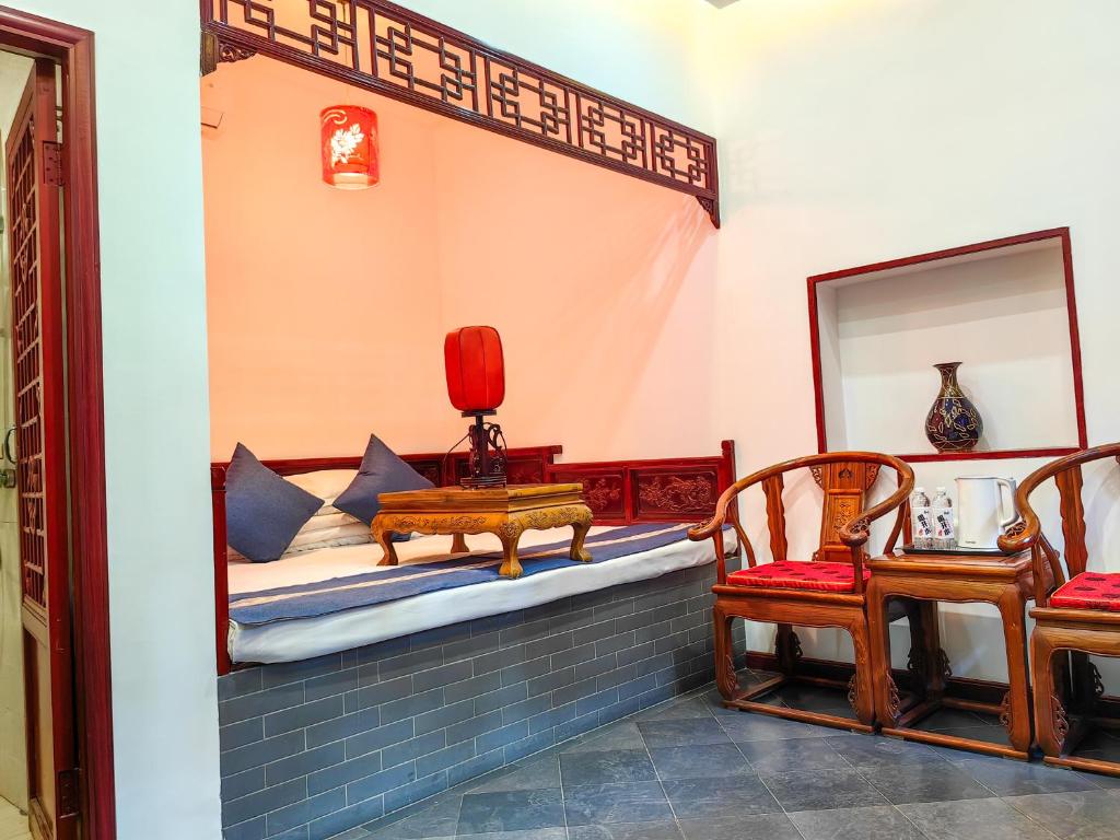 Posezení v ubytování Pingyao Harmony Hotel