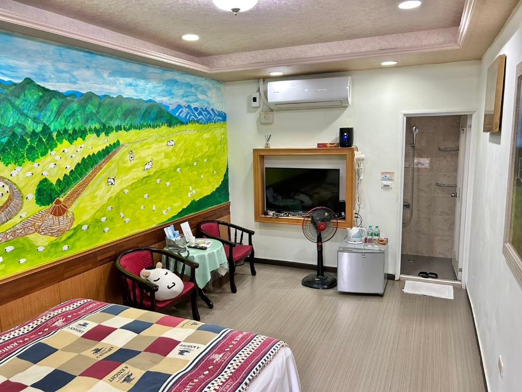 TV a/nebo společenská místnost v ubytování TREE HOUSE