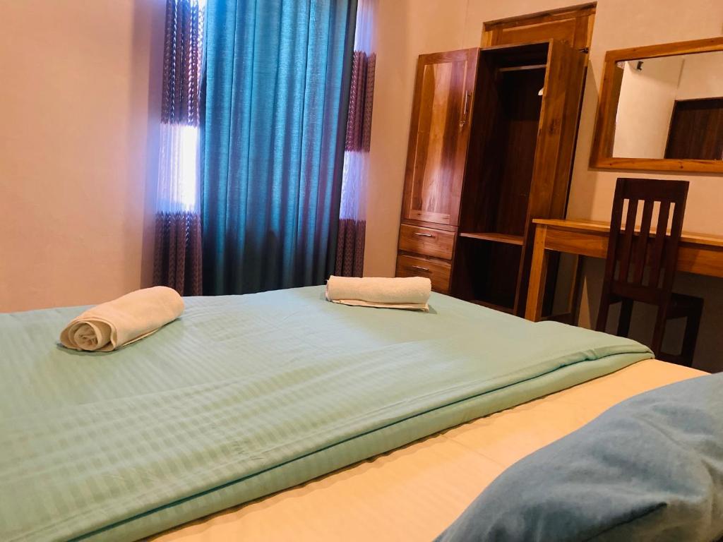 Postel nebo postele na pokoji v ubytování Beach Escape