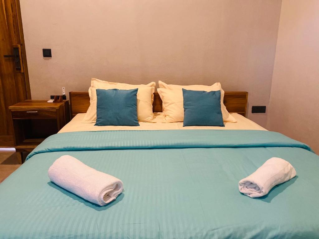 Postel nebo postele na pokoji v ubytování Beach Escape