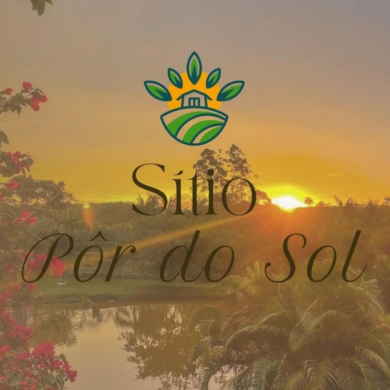 a sign for a sol oil company with the sunset in the background at Sítio Por do Sol in Piçarras