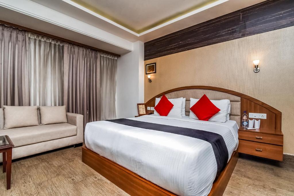 Кровать или кровати в номере Hotel MSK Residency