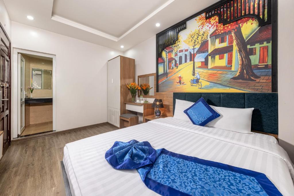 Postel nebo postele na pokoji v ubytování Aquarius Grand Hotel