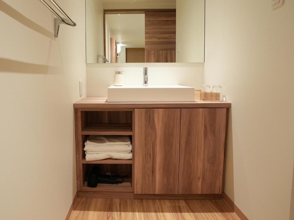 Koupelna v ubytování Hakuba Ryujin Onsen RYOKAN SUI
