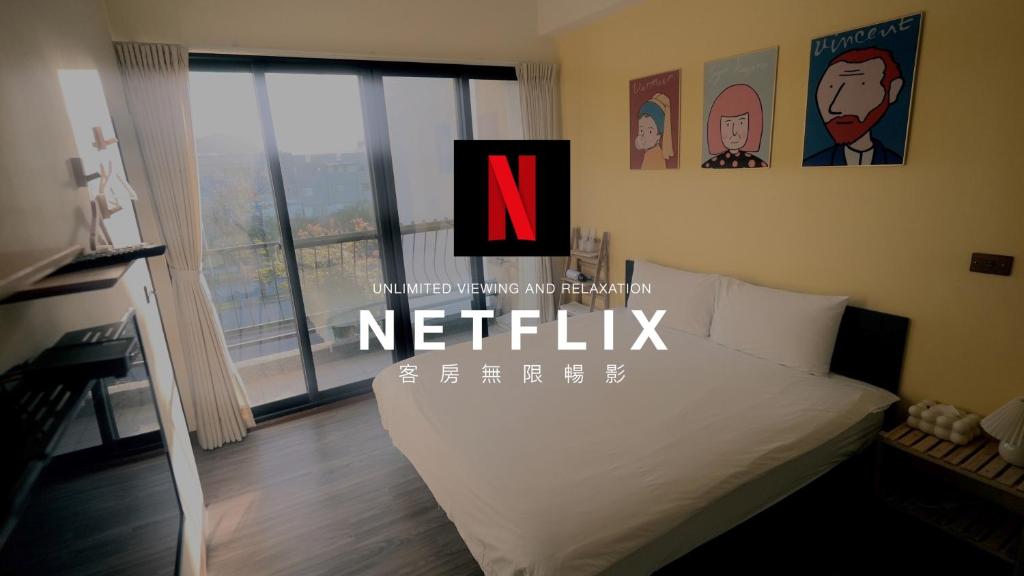 TV a/nebo společenská místnost v ubytování 咻咻宿 Xiuxiu 電梯宅