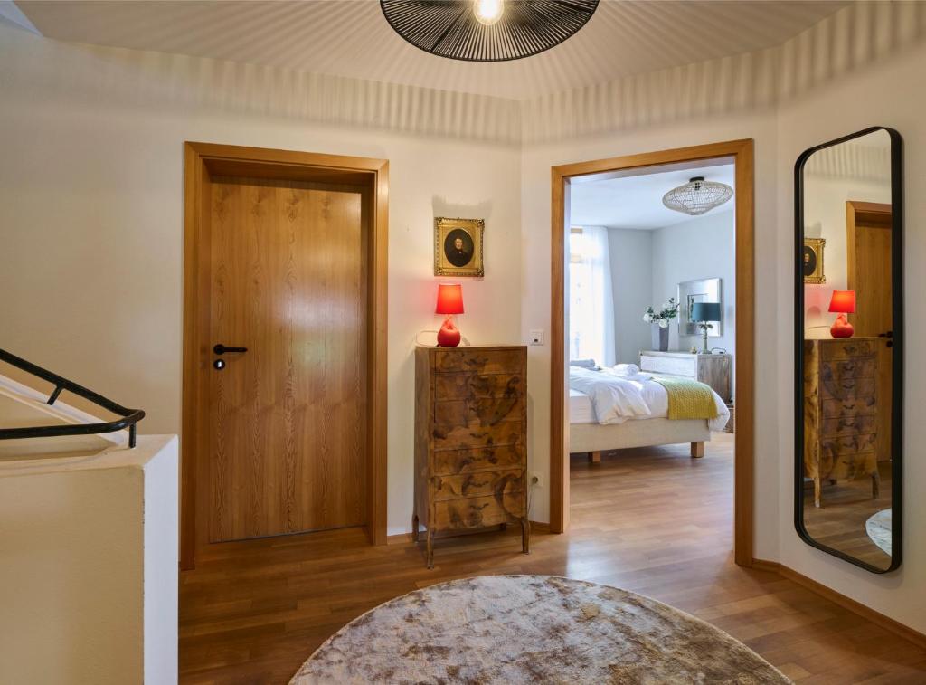 Postel nebo postele na pokoji v ubytování Chalet Waging am See 4 Schlafzimmer