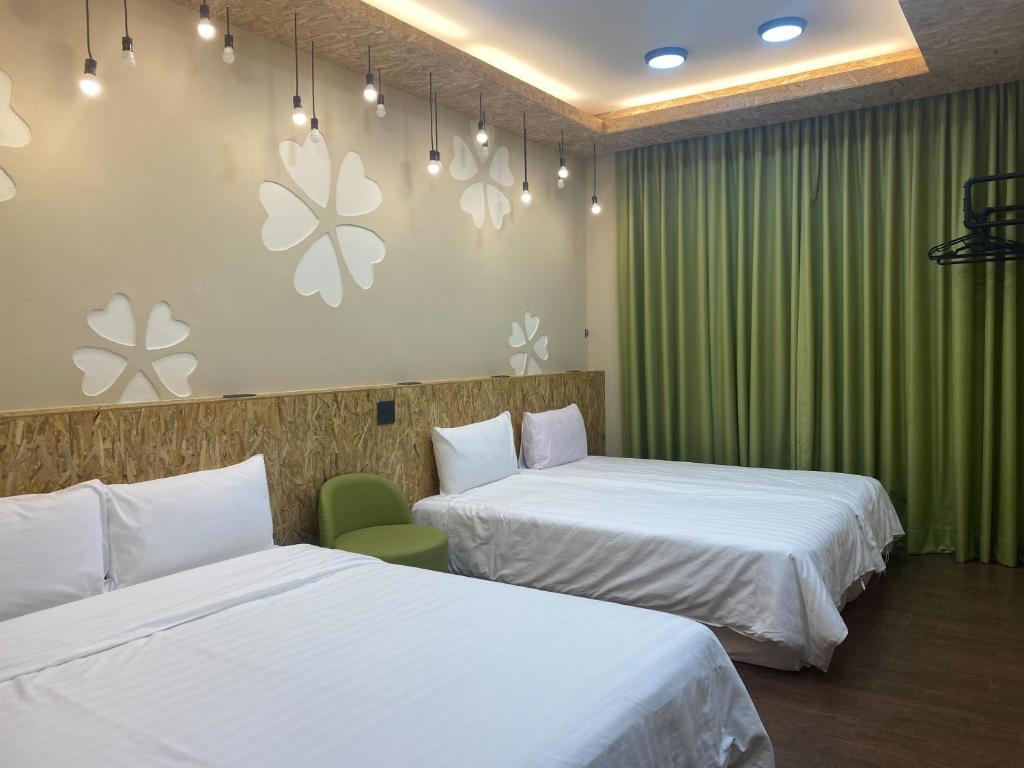 Postel nebo postele na pokoji v ubytování Chin Shue B&B