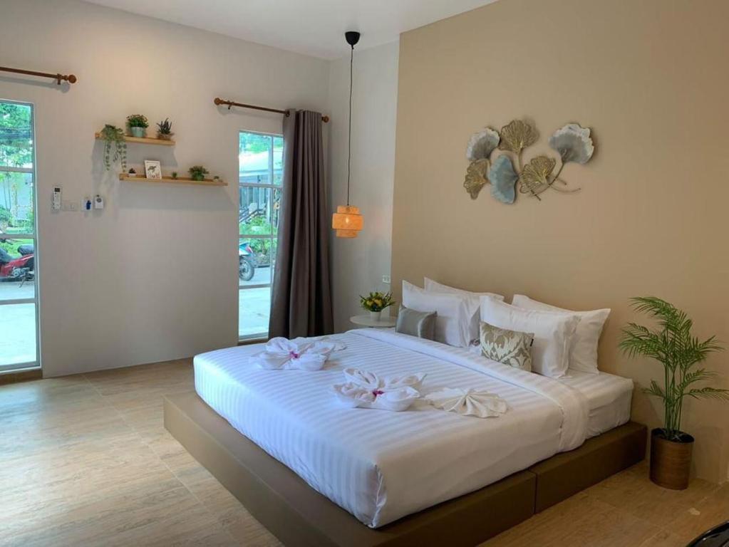 Postel nebo postele na pokoji v ubytování Samet Lucky Resort