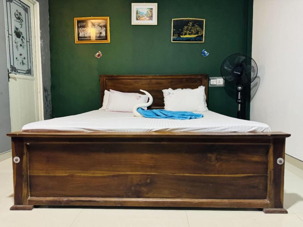 Postel nebo postele na pokoji v ubytování Tiny Homestay