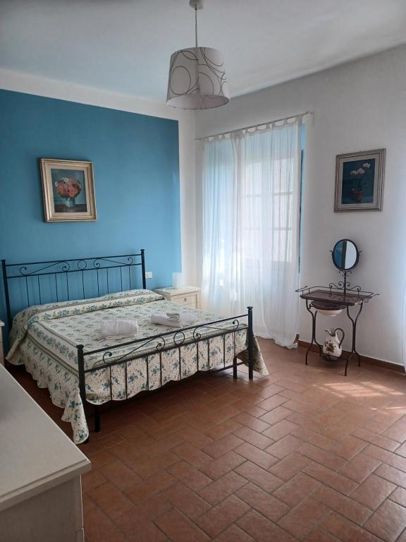 Postel nebo postele na pokoji v ubytování Casa di Adriano