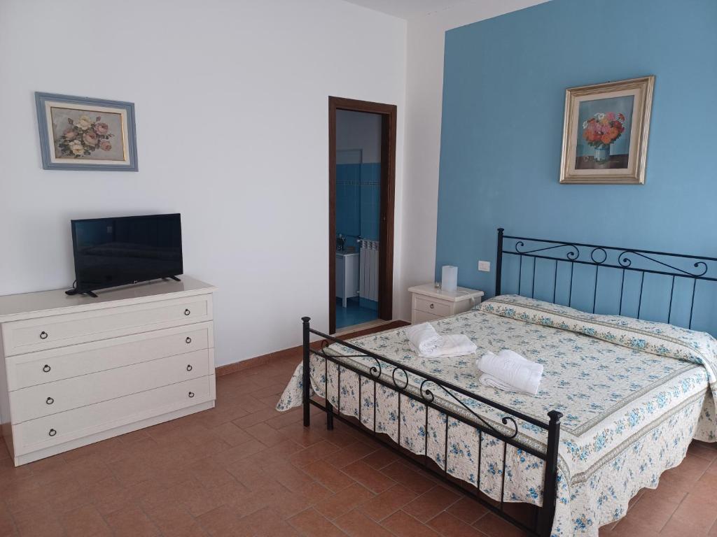 Postel nebo postele na pokoji v ubytování Casa di Adriano