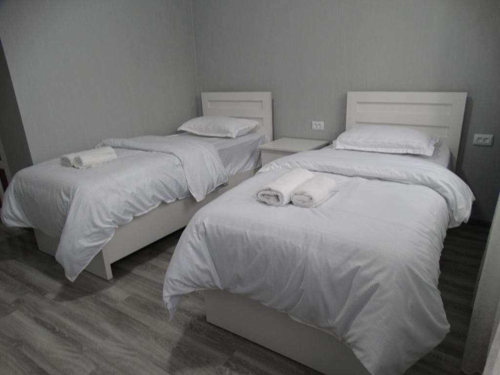 Letto o letti in una camera di VST KHANOYAN'S HOTEL